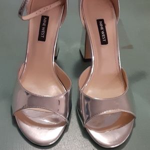 Silver ankle strap shoes. Nine west